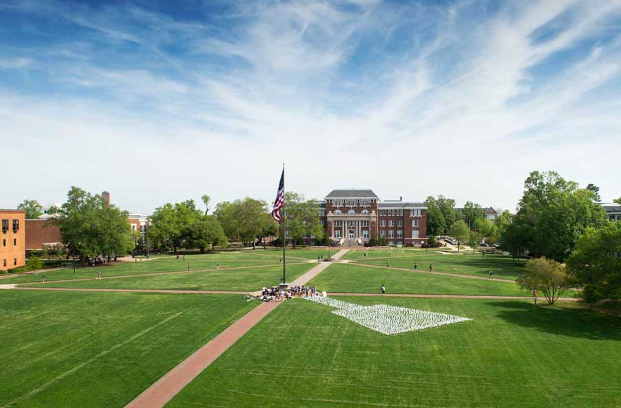 Top down shot looking at center of MSU Drill Field with flag in the center